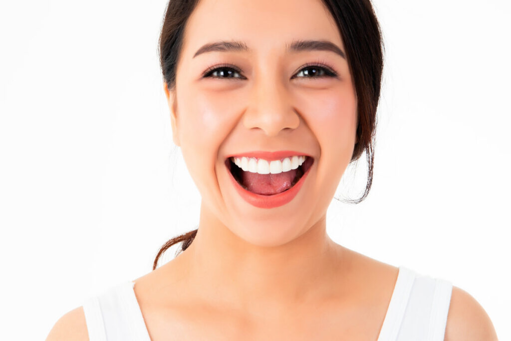 Portrait beautiful Asian woman is smiling, cheerful and strong, with perfect white teeth and clean care.